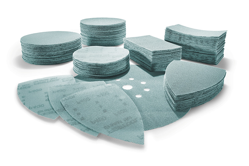 Eine Sammlung verschiedener Netzschleifmittel Aufsätze